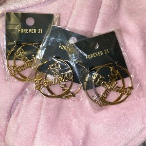Feminist gold hoop earrings 😍